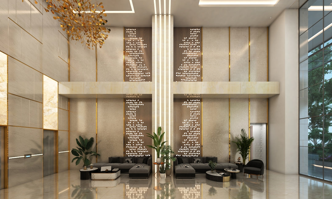 Modern lobby with plush seating and decorative walls.