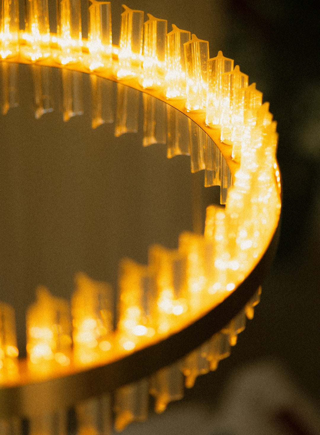 Close-up of a circular light fixture with glowing elements.
