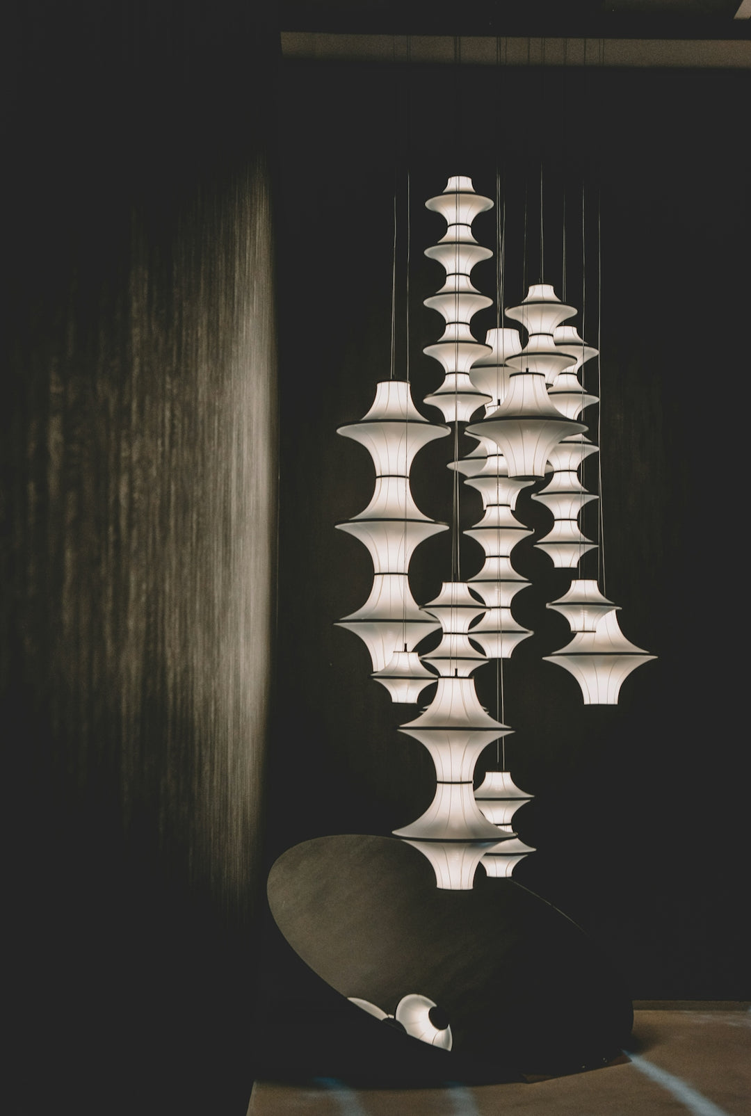 Modern pendant lights hanging in a dark room