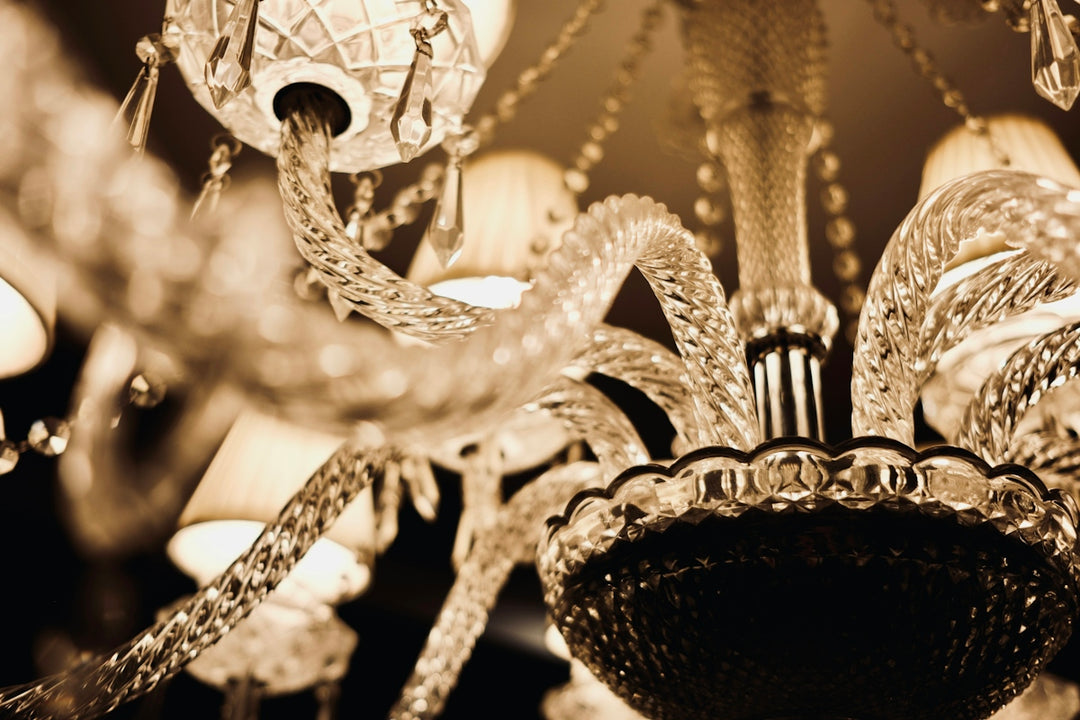 Close-up of an ornate crystal chandelier with lights
